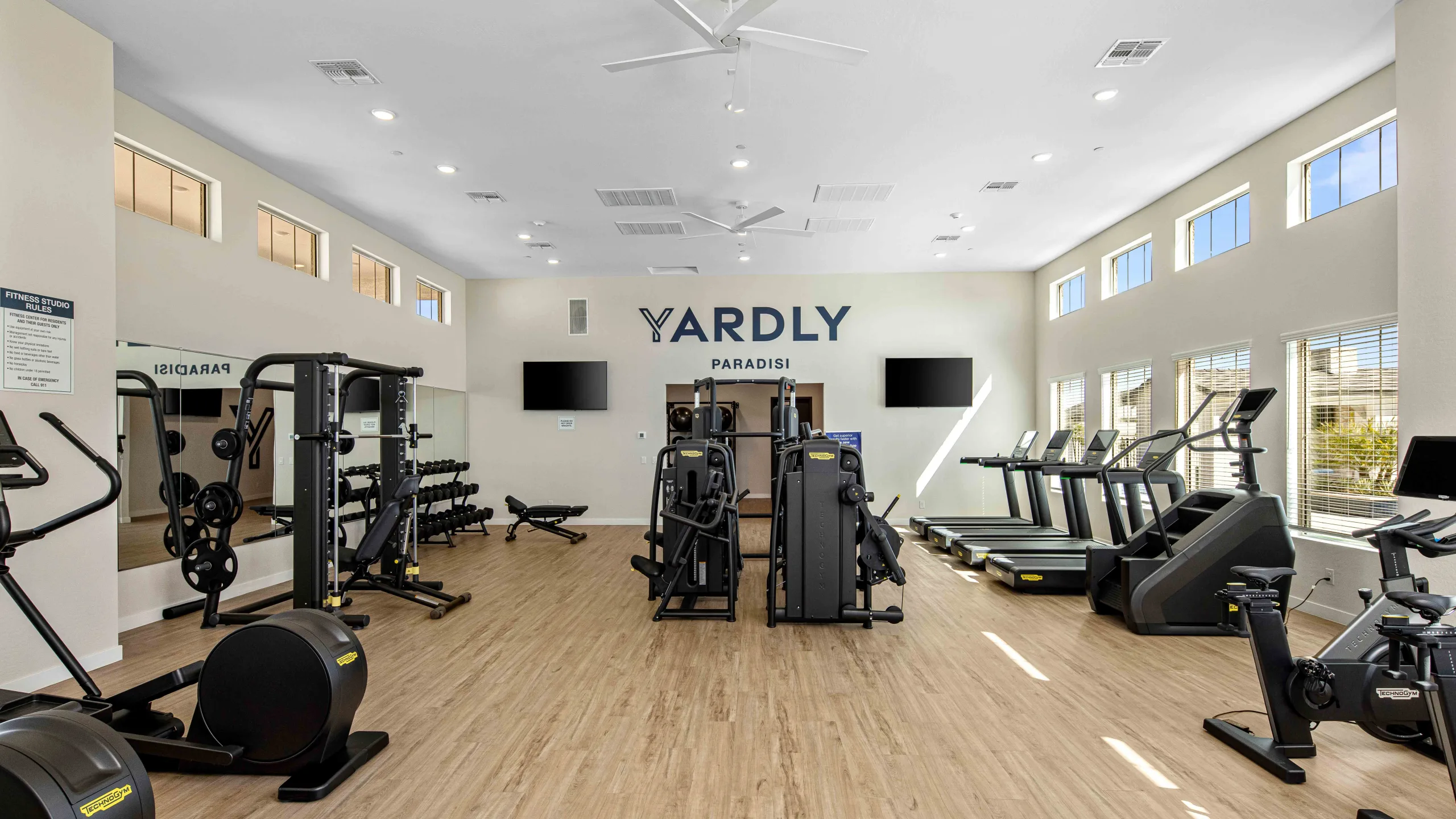 Onsite gym at Yardly Paradisi, new homes that are pet- friendly for rent with backyards near Phoenix AZ.