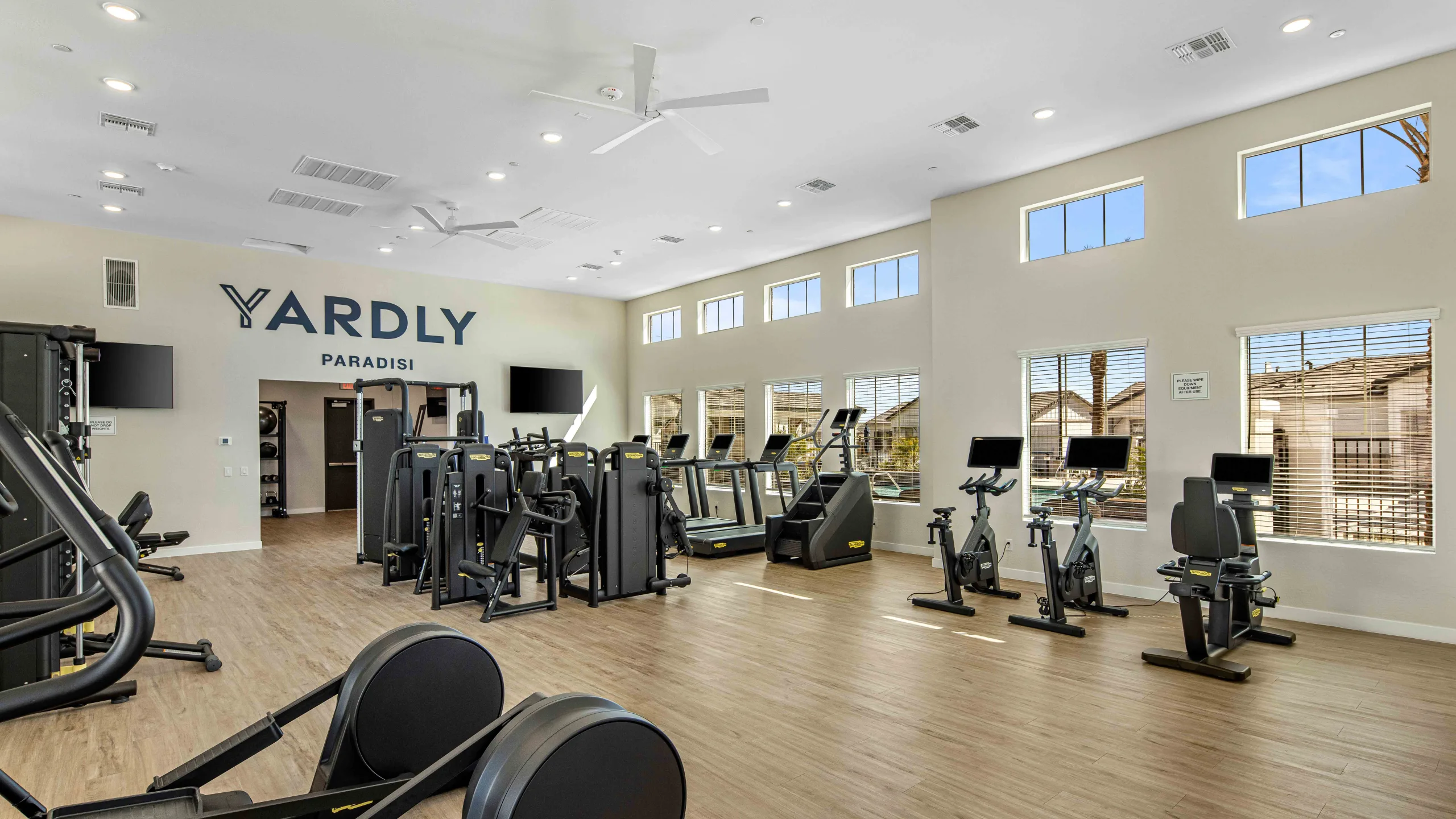 Onsite gym at Yardly Paradisi, new homes that are pet- friendly for rent with backyards near Phoenix AZ.